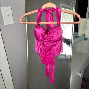 fashion nova hot pink corset top with a halter neck and zipper